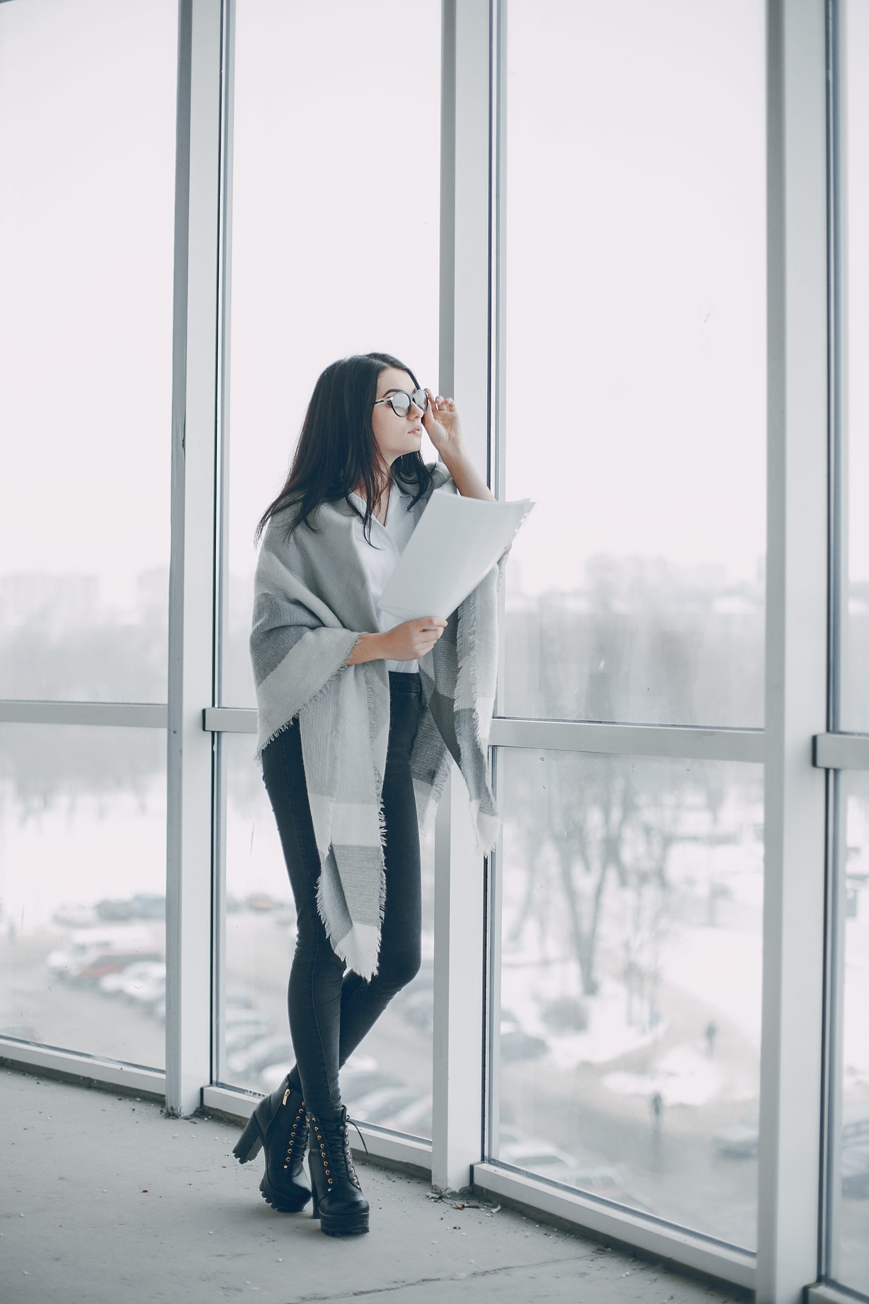 beautiful business woman in a office and engaged in the business
